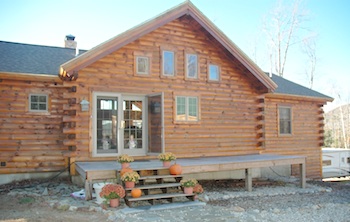 Log home deck and front door