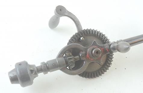 Ornate breast drill with universal chuck
