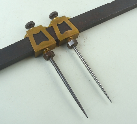 8" brass and steel trammel points on 40" bar